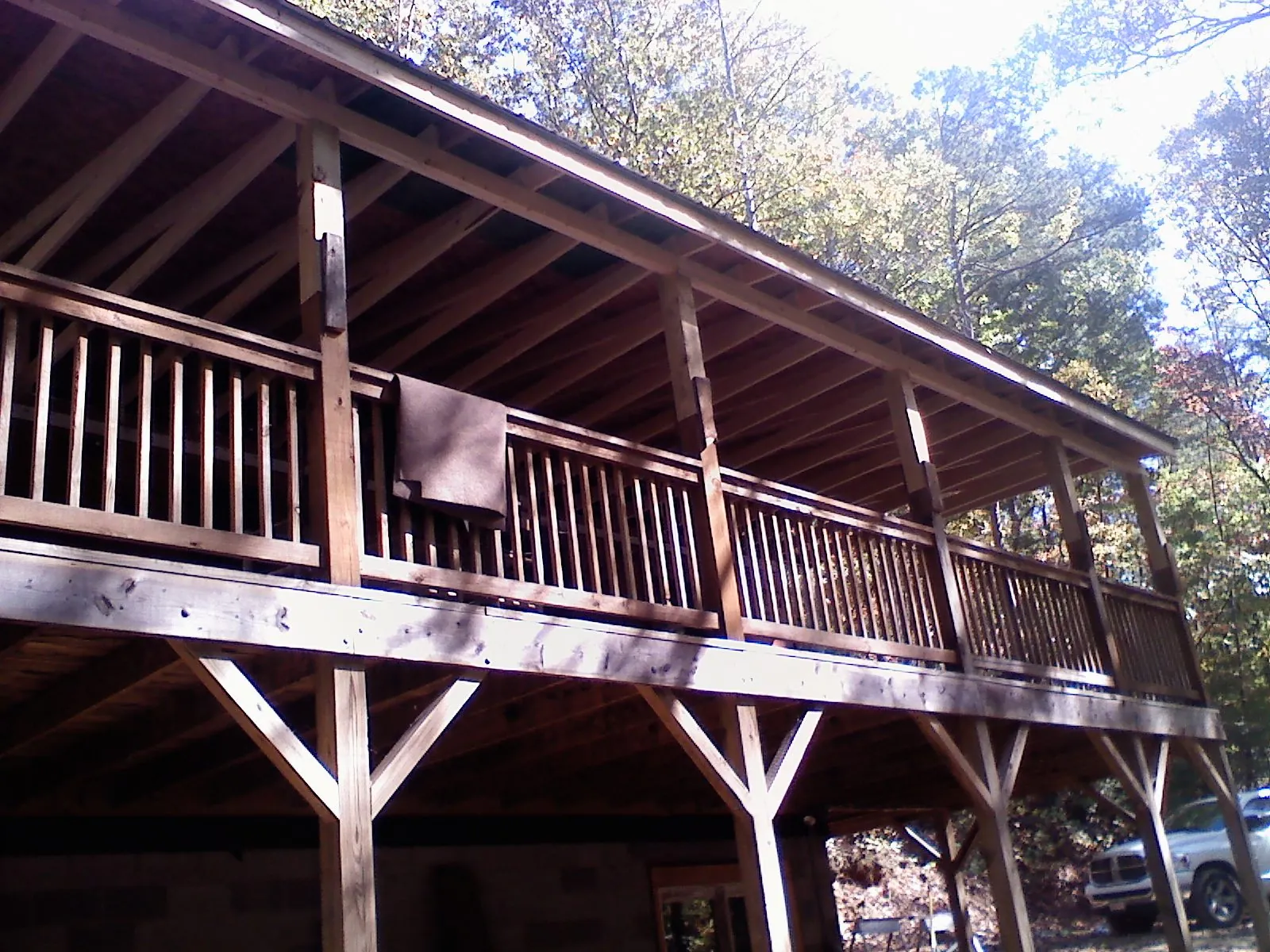 Timber framing under a new elevated porch and deck — Roof Leak Repair in Bonduel by Roofing Brothers